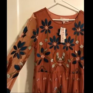 Beautiful dress with sheer sleeves!